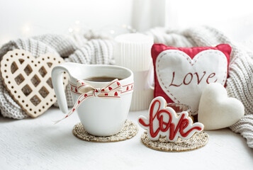 Festive composition with a cup and decor details for Valentine's Day. - Powered by Adobe