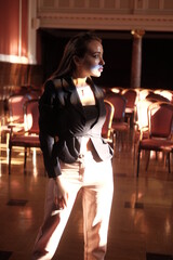 Portrait of a young girl. Elegant and melancholy portrait. Beautiful woman in classic clothes