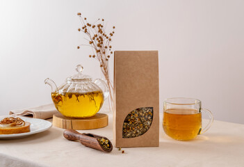 Organic tea branding and packaging mockup. Blank tea packaging mockup with tea. Kraft paper pack...