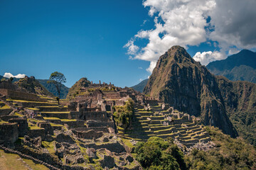 Machu Picchu ancient ruins of the Inka empire in Peru - obrazy, fototapety, plakaty