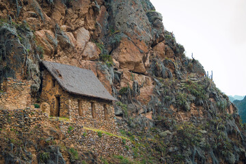 Grain, hay, wheat or seed storage house in the Inka ruins of Ollantaytambo, Peru