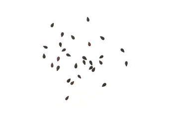 Black sesame seeds on white background.