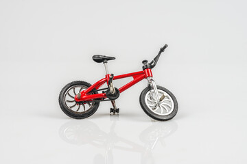 Obraz premium red bicycle isolated from white background