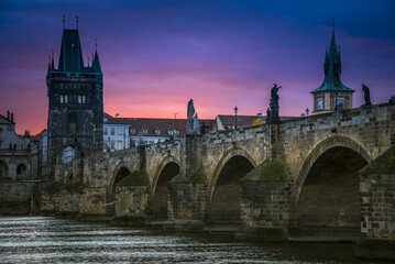 Scenic view of the mysterious Charles Bridge at sunrise
