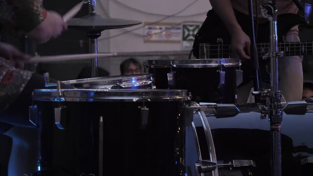 drummer man playing drums in concert slow motion 4k