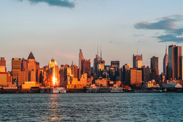 New York downtown centre at sunset, panoramic view on skyscrapers and river