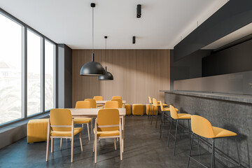Dark cafe interior with panoramic window with town view, table
