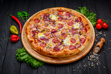 Pizza with quail eggs, ham, sausage and vegetables