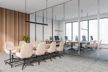 Corner view on bright office room interior with meeting board