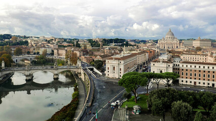 The city of Rome along the river Ron in the background with St. Peter's Cathedral in the Vatican  - 488317625
