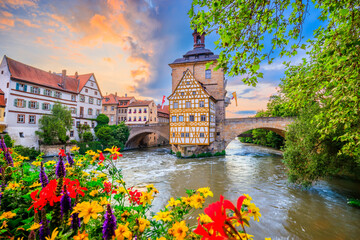 Bamberg, Germany. Town Hall of Bamberg (Altes Rathaus) with two bridges over the Regnitz river. Upper Franconia, Bavaria. - obrazy, fototapety, plakaty