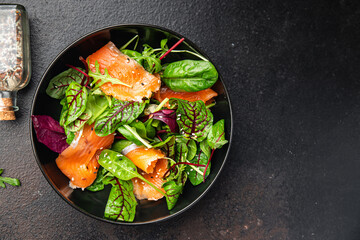 salmon salad slices fish green salad mix leaves seafood fresh healthy meal food diet snack on the table copy space food background 