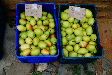 Pears are exhibited for sale at a local market in Turkey