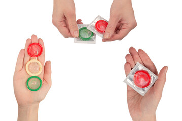 Condom in woman hand isolated on white background.