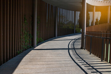 Modern walkway of building with sunlight in summer