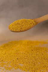 millet in spoon.
millet porridge.
