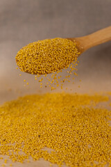 millet in spoon.
millet porridge.

