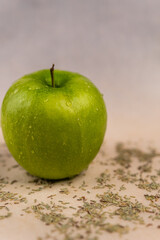 Green apple on the table.
Apple in drops.
Green apple.