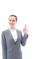 グッドサインをするスーツを着たビジネスウーマン