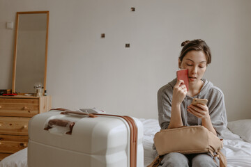 woman with the baggage at home