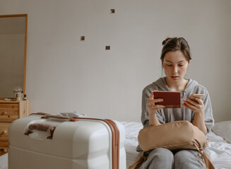 woman with the baggage at home