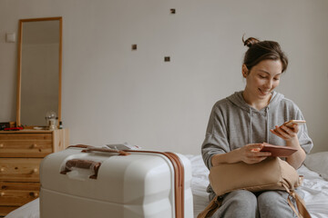 woman with the baggage at home