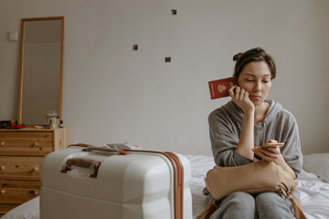 woman with the baggage at home