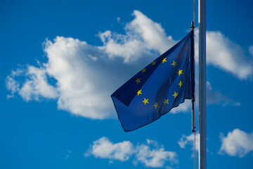 the flag of europe.the flag of europe with a blue background and a white cloud.