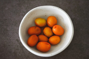 Spiced olives in a white bowl