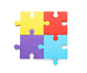 Colorful puzzle pieces on white background. Concept of autistic disorder - obrazy, fototapety, plakaty