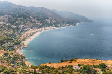 Fototapeta na wymiar Aerial view of the beautiful waterfront of Taormina, Sicily, Italy