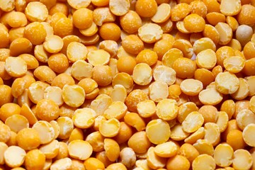 Closeup photo of natural dried yellow peas rotating