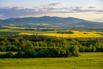 view on Kaczawskie mountains in Sudeten during sunset at spring in Poland