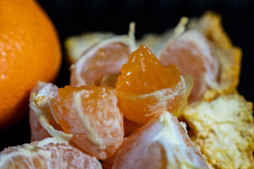 peeled tangerine on a plate