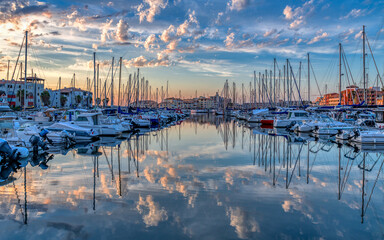 Ships and boats on a beautiful sunset taken in Port Leucate South of France a Mediterranean...