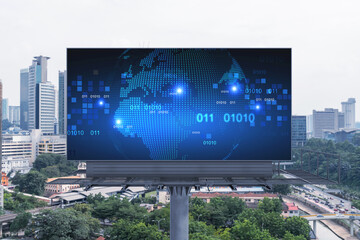 World planet Earth map hologram on billboard over panorama city view of Kuala Lumpur, Malaysia, Asia. The concept of international connections and business.