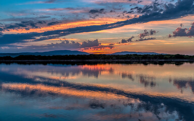 Beautiful sunset taken in Port Leucate South of France with sky reflection in a Mediterranean landscape