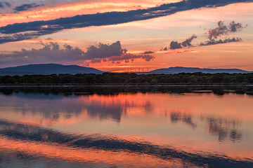 Beautiful sunset taken in Port Leucate South of France with sky reflection in a Mediterranean...