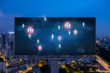 Hologram of Earth planet map on billboard over night panoramic cityscape of Kuala Lumpur, Malaysia,...