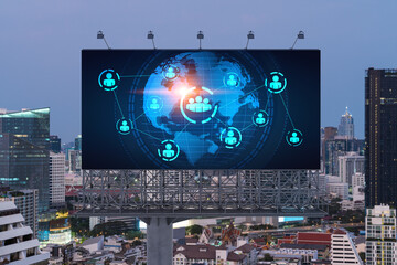 World planet Earth map hologram of social media icons over sunset panoramic cityscape of Bangkok, Southeast Asia. The concept of people connections.