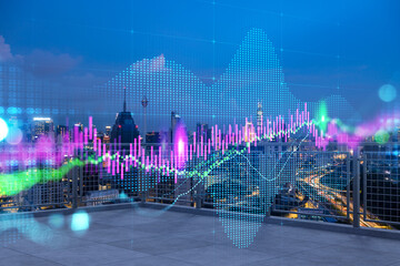 Rooftop with concrete terrace, Kuala Lumpur night skyline. Forecasting and business modeling of...