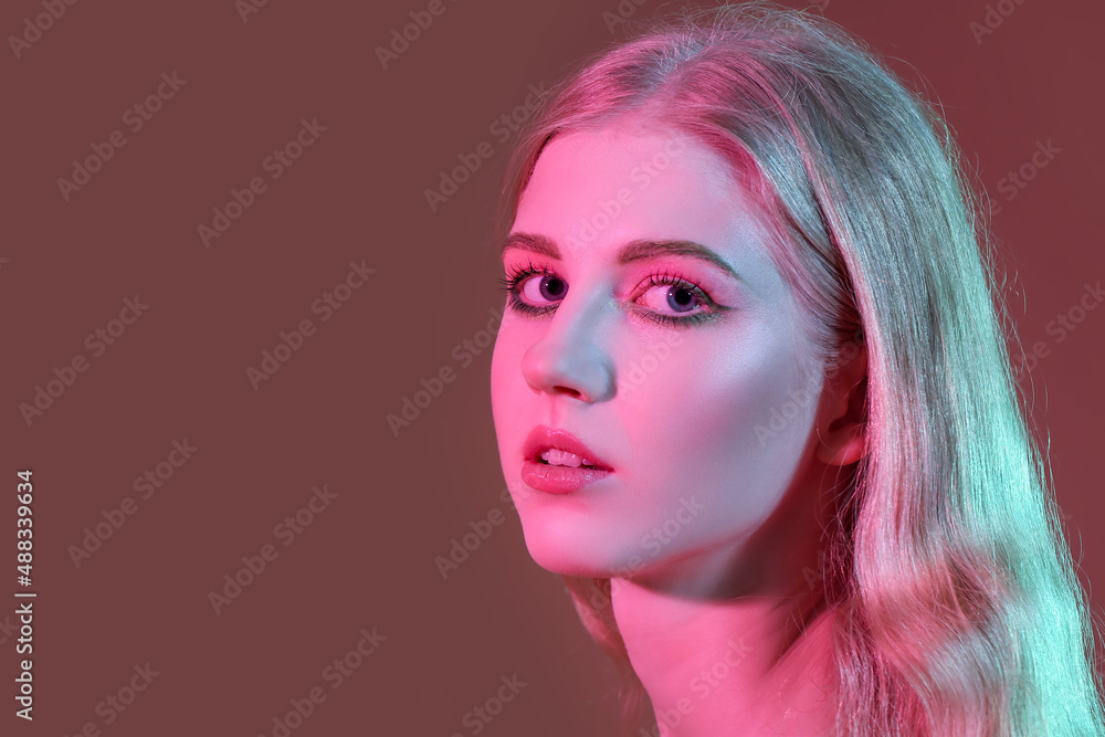 Poster Beautiful girl with stylish makeup on color background