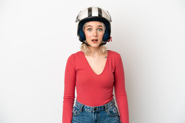 Young caucasian woman with a motorcycle helmet isolated on white background with surprise facial expression