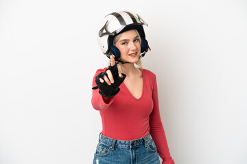 Young caucasian woman with a motorcycle helmet isolated on white background showing and lifting a finger