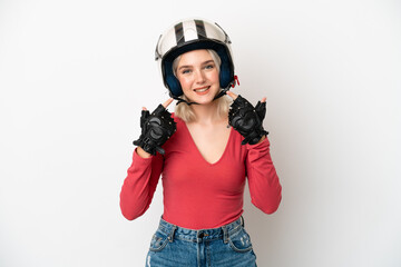 Young caucasian woman with a motorcycle helmet isolated on white background giving a thumbs up gesture
