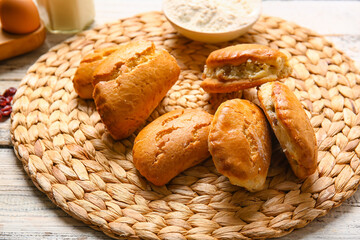 Tasty sochniki with cottage cheese on table