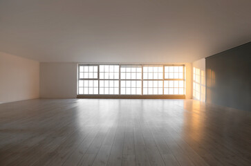 View of empty room with big windows and shelves