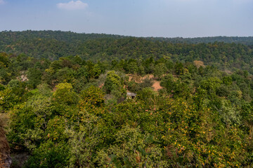 A beautiful landscape view of lord shiva temple forest from top of mountain. - 488342433