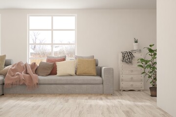 White living room with sofa and winter landscape in window. Scandinavian interior design. 3D illustration