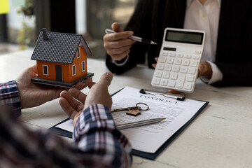 A rental company employee is calculating the cost for the customer to agree to sign a rental...
